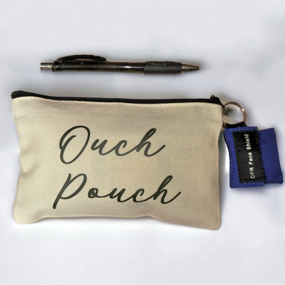 First aid kit - travel pouch - fully stocked - ouch pouch